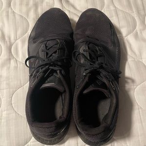 Black adidas running shoes